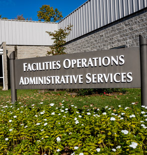 Facilities Operations and Administrative Services sign outside building.