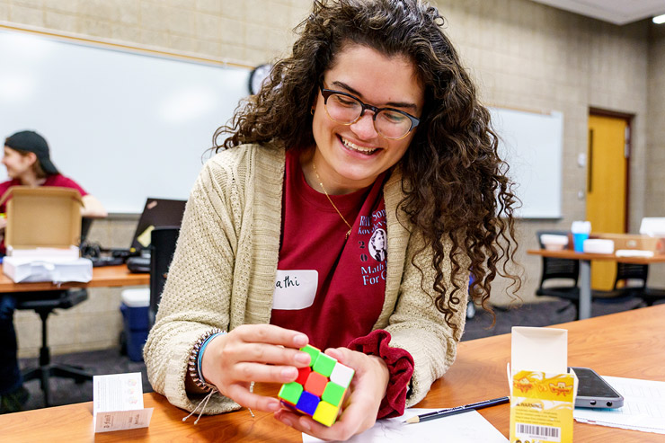 Student with cube puzzle