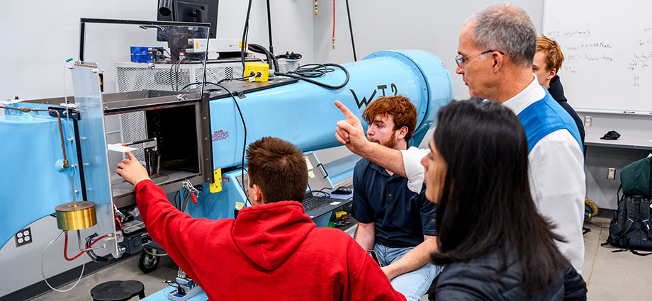 Rose-Hulman students and faculty work on a project in a theoretical aerodynamics class.