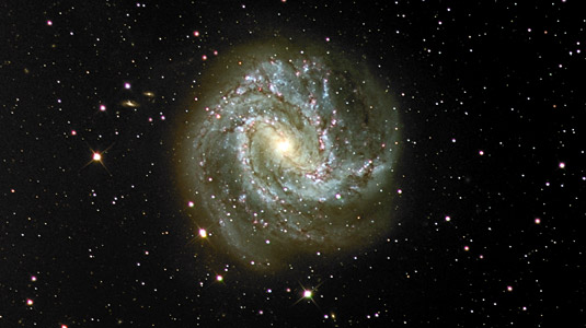 An image of M83, the Thousand-Ruby Galaxy, a pinwheel galaxy about 12 million light yearsaway.