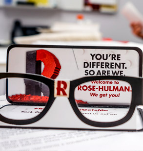 Rose-Hulman acceptance notice with cardboard nerd glasses.
