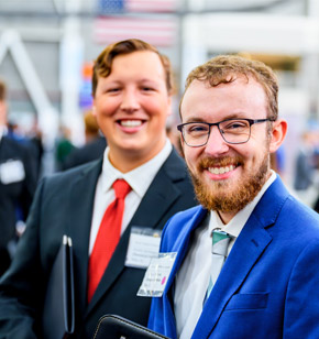 Student meets with company recruiters at Career Fair