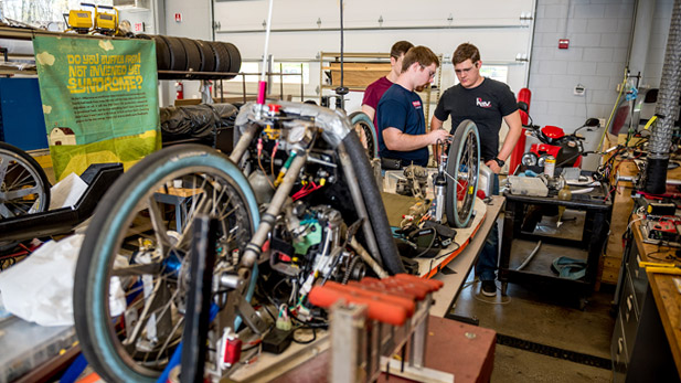 Students working on their efficient vehicle in the Branam Innovation Center
