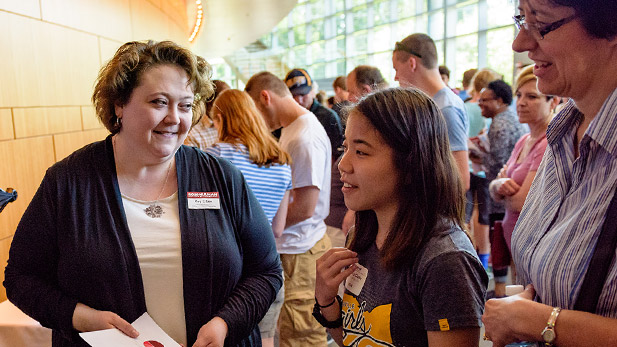 Kay C Dee talking with prospective student during a campus visit