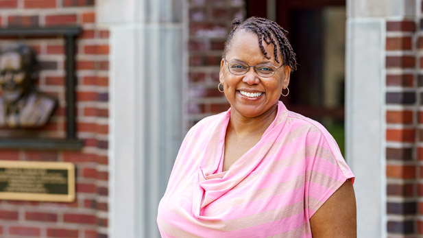 Carlotta Berry stands outside.