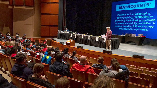 A faculty member speaks to a group of students at the Mathcounts competition hosted by Rose-Hulman'