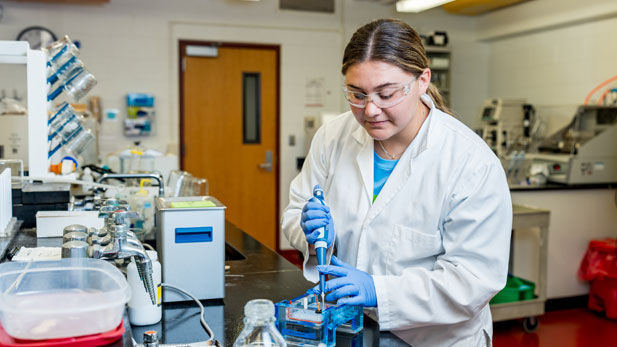 Cassidy Ryan working in a laboratory