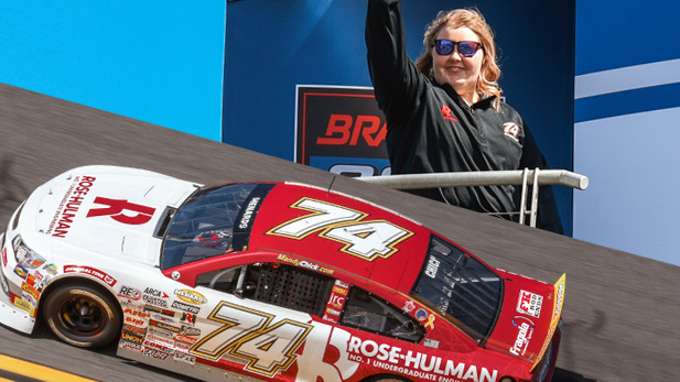 Mandy Chick waves to the crowd, races her Rose-Hulman car at Daytona.