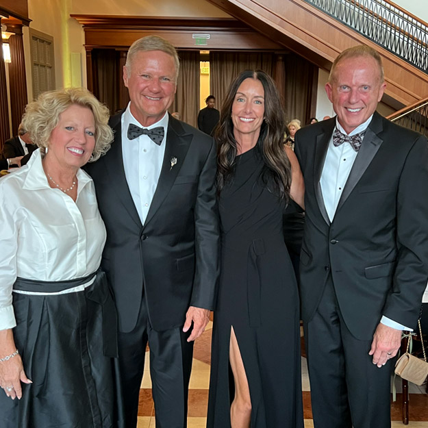 Photo of Greg Gibson and his wife, Amy, with President Rob Coons and Tammy Coons at the Indiana Historical Society's annual gala 