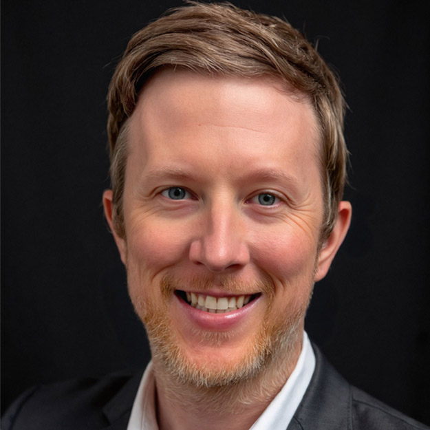 Mike Reust with his wife and toddler daughter.